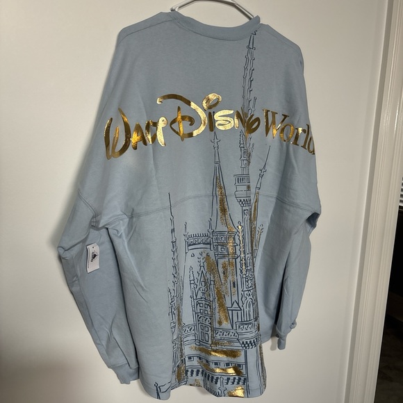 Disney Tops - Disney Parks 2026 Blue & Gold Cinderella Castle Spirit Jersey, new with tags